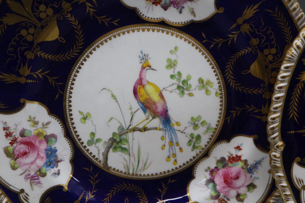 A pair of Royal Crown Derby plates, gilt decorated with birds and flowers, diameter 26cm